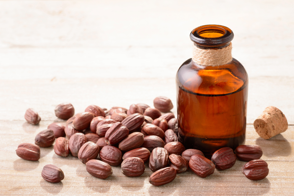 Jojoba oil, rich in revitalizing vitamins and minerals which improves hair thickness. 