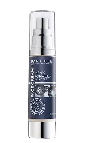 A silver pump bottle labeled Particle Men's Formula Daily Care Face Cream.