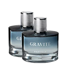 Two identical bottles of Gravité Particlé perfume in a clear blue setting.